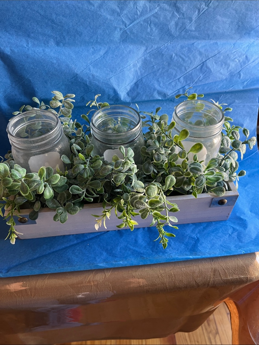 Rustic White Wooden Tray with Green Faux Garland and Glass Jars